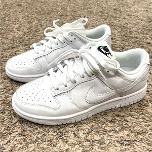 Nike dunks triple white women’s